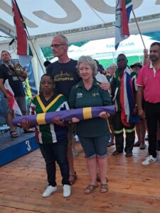 Handing over WGA flag at close of 2022 WGA Championships